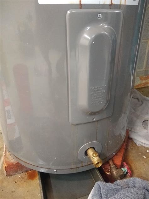 hot water heater leaking from side panel|Electric Water Heater Leaking from Side Panel: Quick。